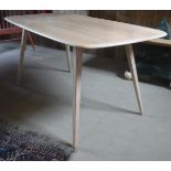 An Ercol beech plank table on square tapering splayed legs CONDITION REPORTS Light