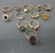 Twelve various 9 carat gold and stone set dress rings of varying sizes,