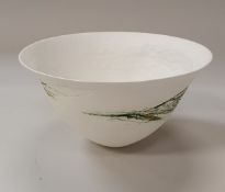 ANGELA MELLOR - a bone china bowl with green glaze and gold leaf decoration on incised pattern,