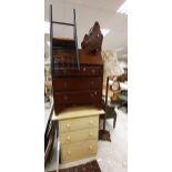 An early 20th Century mahogany bureau on bracket feet,