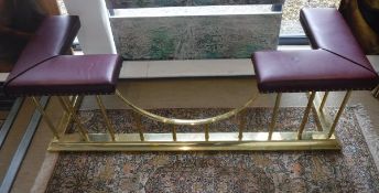 A brass and studded upholstered club fender by Norfolk Fenders General Dimensions (Approx): Height