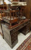 A modern pedestal desk with leather insert top, a mahogany nest of four tables,