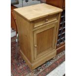 A Continental pine pot cupboard with single drawer over cupboard door,