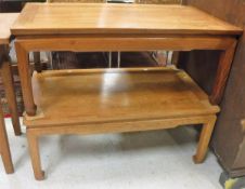 A pair of Chinese style hardwood coffee tables