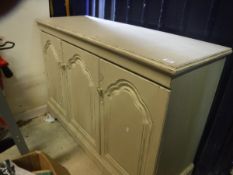 A modern painted three door side cabinet in the 19th Century Continental style,