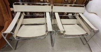 A pair of Wassily cream leather and chrome chairs after the design by Marcel Breuer