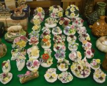 A collection of various relief work china posies by Royal Albert, Aynsley, Coalport,