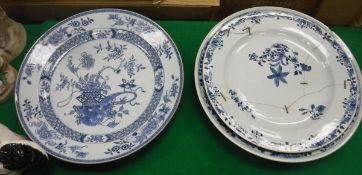 A 19th Century Chinese blue and white charger with central flowers in a vase decoration,