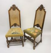 A set of six 17th Century walnut framed dining chairs with needlework upholstered seats (all