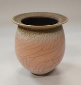 DAVID WHITE (1934-2011) - a porcelain wide-rimmed jar, pink / peach crackle glaze,