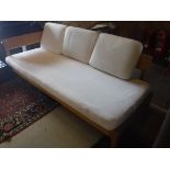 A Habitat oak framed day bed with cushions