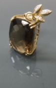 A 9 carat gold mounted smoky quartz pendant of cushioned rectangular form