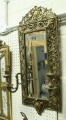 A late Victorian giltwood and gesso framed girandole mirror with milk glass panels and central