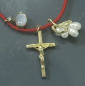 A 9 carat gold mounted moonstone and diamond set pendant together with a 9 carat gold crucifix and