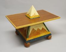 A Horus type coffee table of pyramid design,