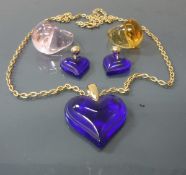 WITHDRAWN A Lalique blue glass loveheart shaped pendant with graduated border,