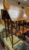 An oak folding reading table in the Arts and Crafts manner