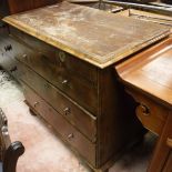 An early 18th Century walnut chest of two short over three long drawers,