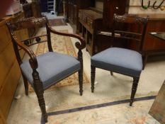 A set of eight William IV mahogany bar back dining chairs with upholstered seats on turned and