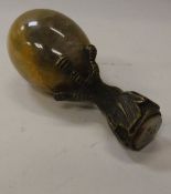 A Victorian seal of eagle claw form holding a bluejohn egg inscribed CONDITION REPORTS