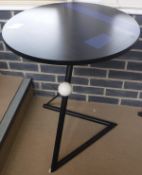 An occasional table in the modernist style,