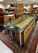 A 1970's Pieff dining room suite comprising a "Mandarin" glass topped table on chrome supports with