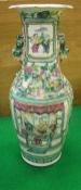 A 19th Century Chinese famille-rose vase with figural panel decoration depicting warriors on