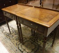 A pair of walnut lamp tables in the Regency style,