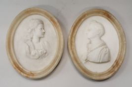 A pair of circa 1900 alabaster portrait studies of a lady and gentleman