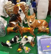 A collection of Beswick figures to include "Seated Beagle" 2300, "Corgi", "Boxer",