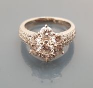 A platinum and diamond set daisy cluster ring, approx 1.6 carat total, ring size N, total weight 7.