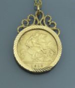 A 1910 half gold sovereign in yellow metal pendant mount,