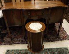 A Victorian mahogany cylindrical pot cupboard of fluted form with grey-veined white marble top,