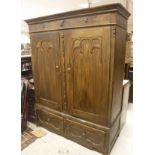 A stained pine armoire in the 19th Century French manner