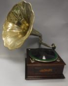 A mahogany cased gramophone with transfer label "Success High Grade" with embossed brass horn,