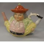 A Victorian pottery Toby teapot as "Peg Leg doing the Splits"