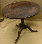 A circa 1800 oak tea table,