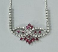 An 18 carat white gold ruby and diamond set necklace, 20.