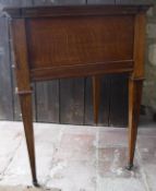 A circa 1900 oak tea or decanter table with double rising top and rising interior,