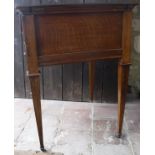 A circa 1900 oak tea or decanter table with double rising top and rising interior,