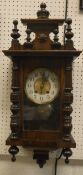 A 20th Century walnut cased Vienna type regulator,