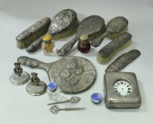 A box containing a pair of silver menu holders with armorial centre inscribed "Presented to The