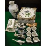 A collection of Portmeirion "Botanic Garden" wares including plates and coffee cups,