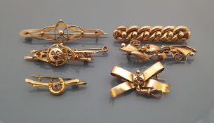 A collection of six Victorian 9 carat gold bar brooches to include a stone and pearl set example.