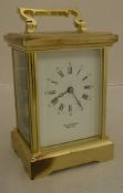 A brass cased carriage clock,