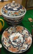 A 19th Century Japanese Arita (Imari) bowl and cover with decoration of bands of flowers in reds,