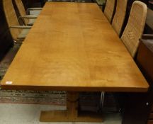 A Robert Thompson of Kilburn (The Mouseman) refectory style dining table with adzed top raised on