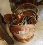 A collection of various copper ware to include helmet shaped coal scuttle, saucepan, ale muller,