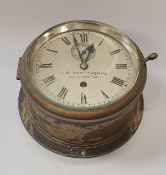 A brass cased ship's clock by J Blount Thomas of Southampton,