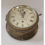 A brass cased ship's clock by J Blount Thomas of Southampton,